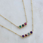 14K yellow gold custom birthstone necklaces close up multicolor gemstone bar 3 and 6 stone options