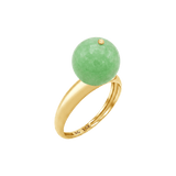 Ring with 14K solid gold dome band, large solitaire jade ball, and gold bead on top.