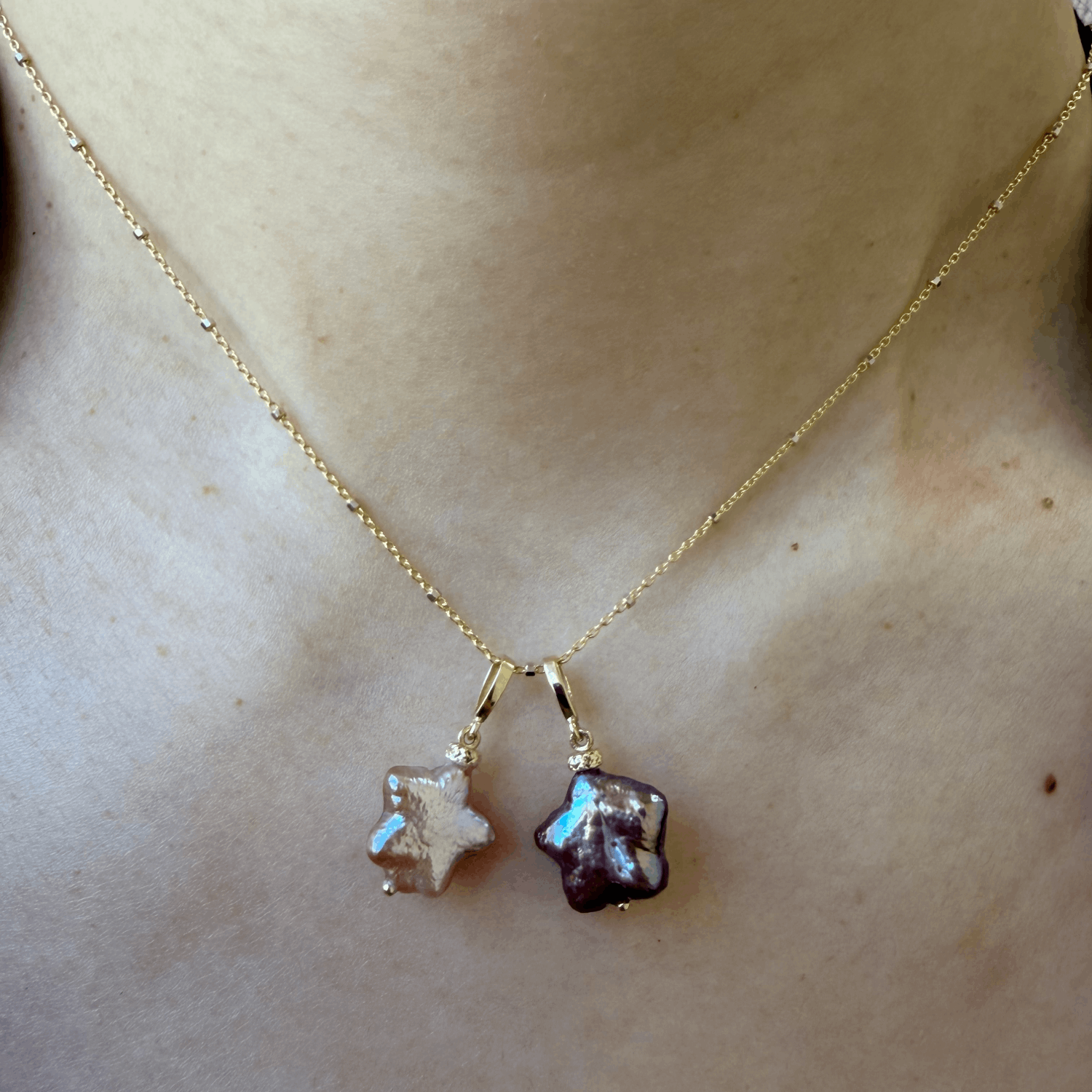 14K solid gold chain with pearl charms shaped as stars and 14K gold bails.