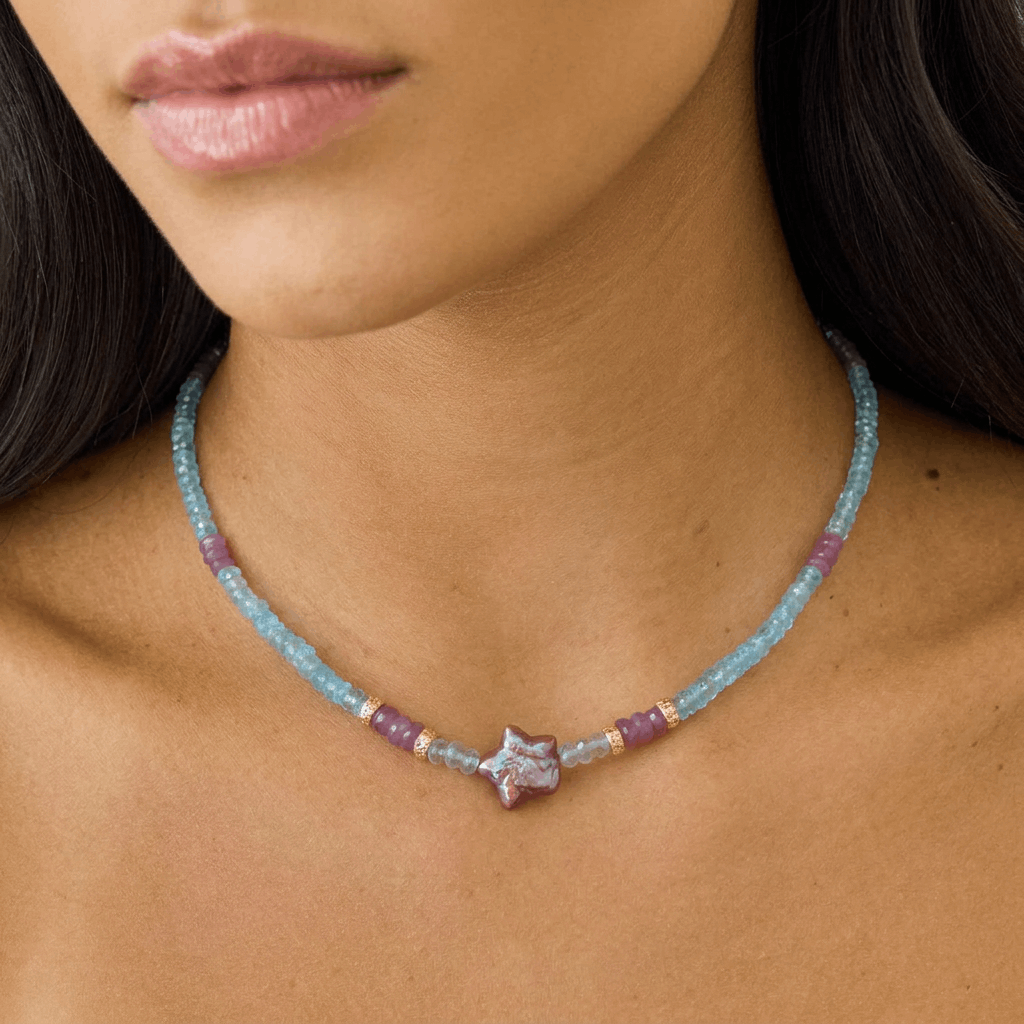 14K gold beads and clasp, aquamarine faceted beads, pink sapphire beads on model's neck.