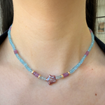 14K gold beads and clasp, aquamarine faceted beads, pink sapphire beads on model's neck.