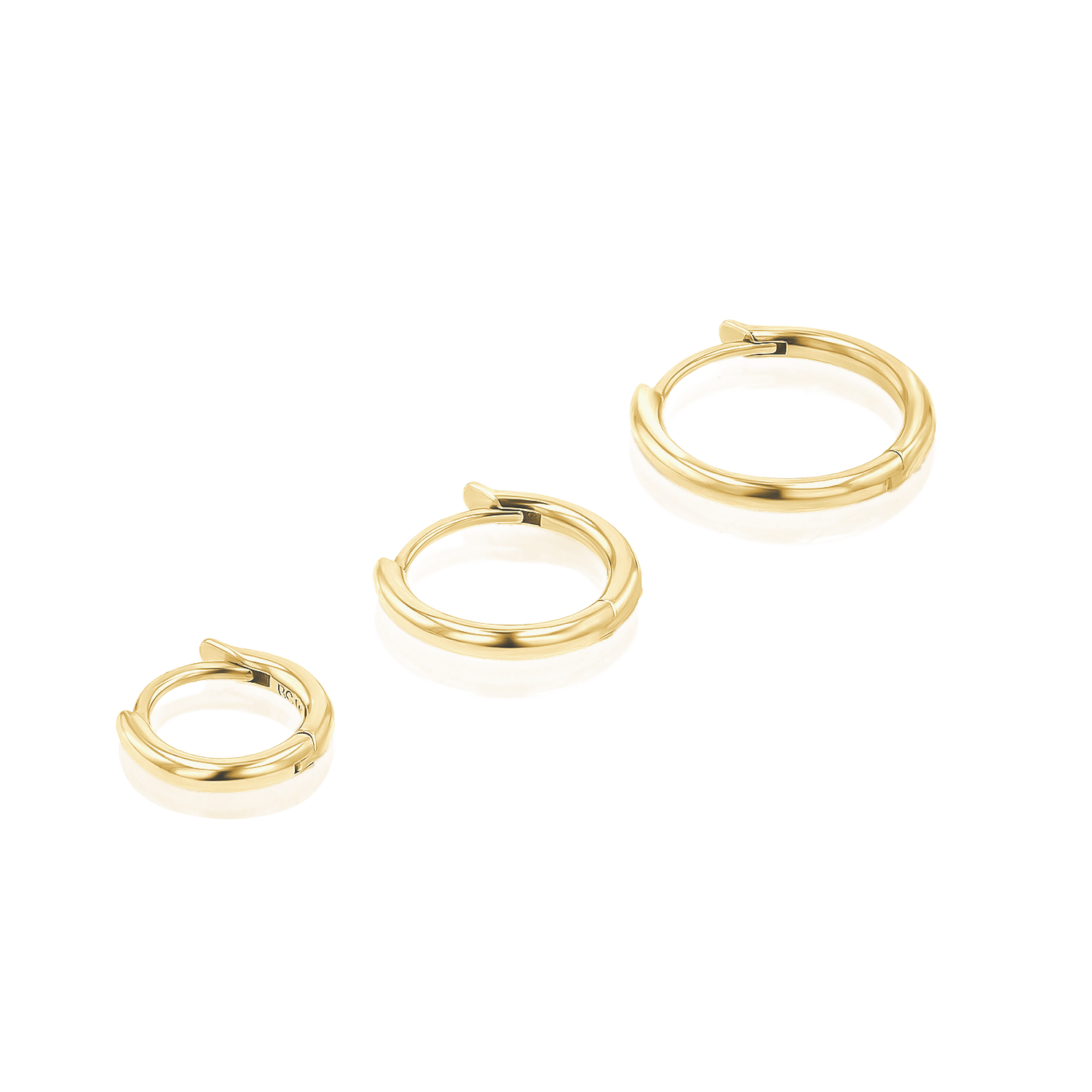 Grand Solid Huggie Hoop Earrings - Image 5